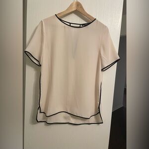 Classic blouse women’s size large in nude and black color with cutout on back